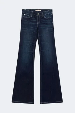 Glow low flare petite jeans