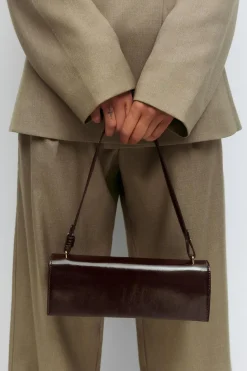 Small patent shoulder bag