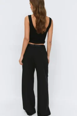 Wide pleated trousers